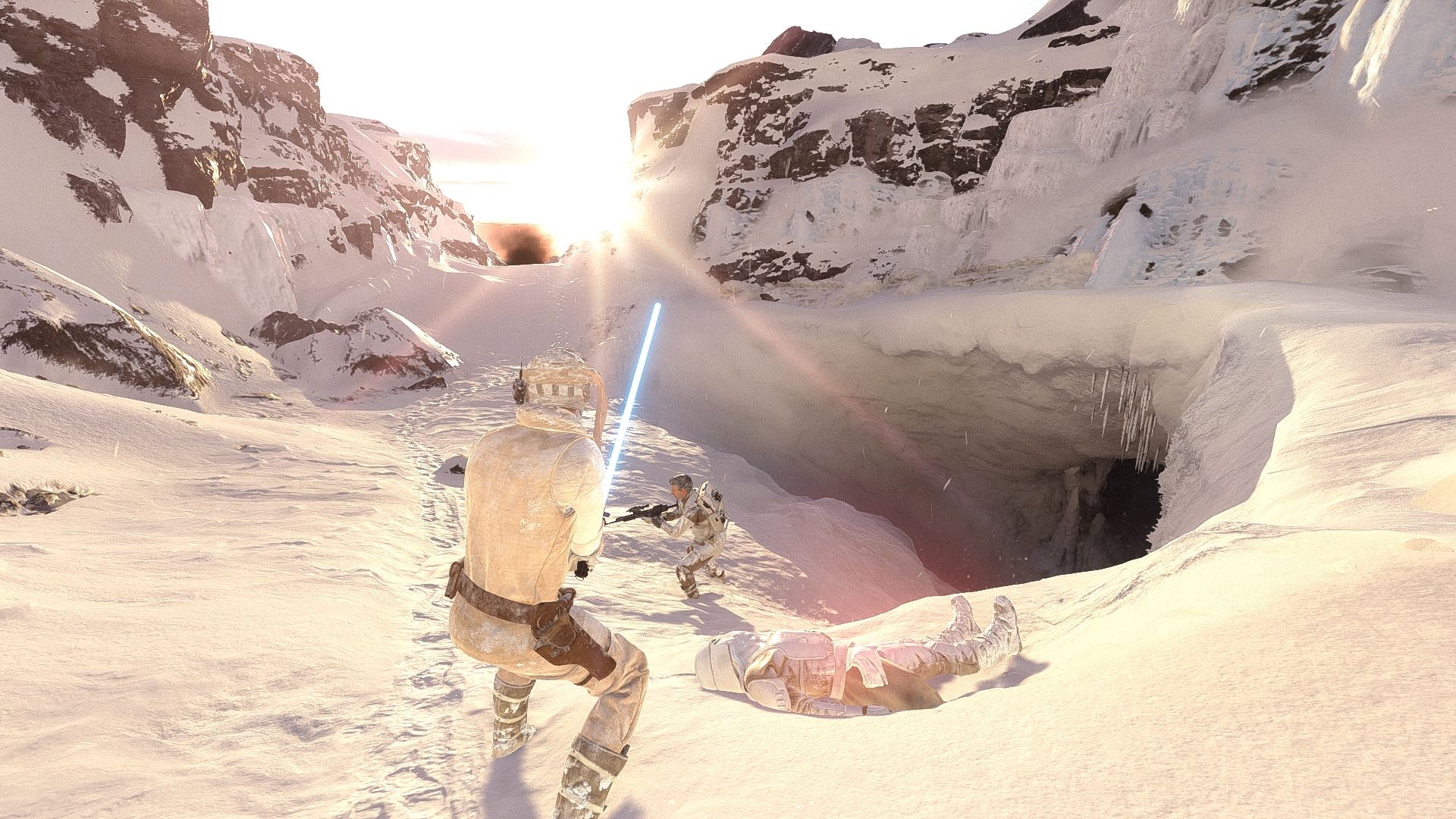 Jedi standing in front of cave entrance with Ally trooper in front and dead stormtrooper in the snow.